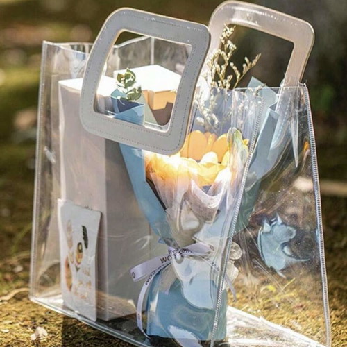 Transparent women handbag like new with white handle