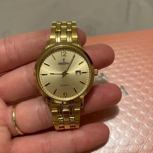 Festina women's watch like new, gold color