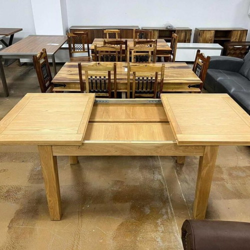 Wooden dining table new with extendable feature