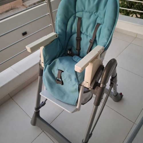 Prenatal high chair used, blue with rear wheels