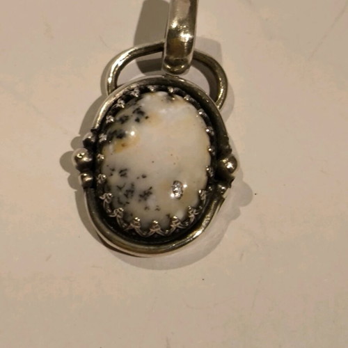 Silver handmade pendant with dendritic opal like new