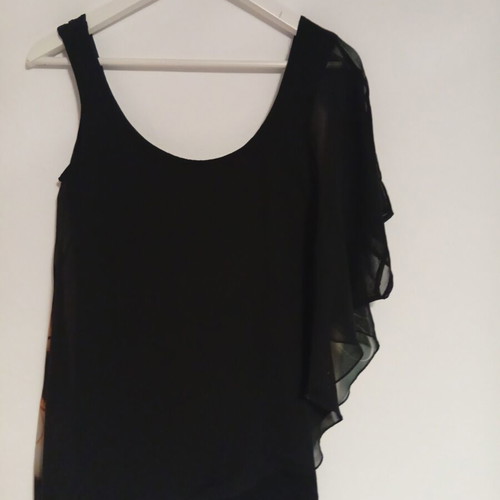 Black asymmetrical blouse with transparent chiffon and print Garantie used