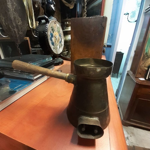 Electric brass briki used with wooden handle