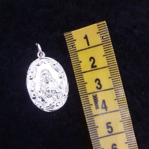 Christian pendant from the 70s, new, gold-colored metal