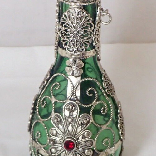 Vintage glass bottle with metal filigree technique from Ioannina folk art workshop