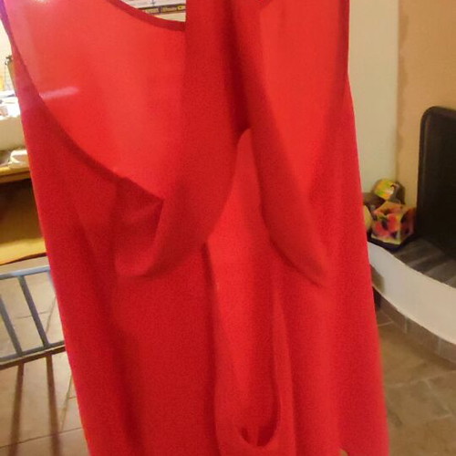 Red sleeveless flowing top used, size S, semi transparent material