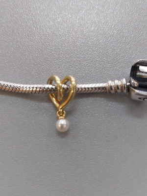 Pandora Heart Symbol Charm like new, gold color