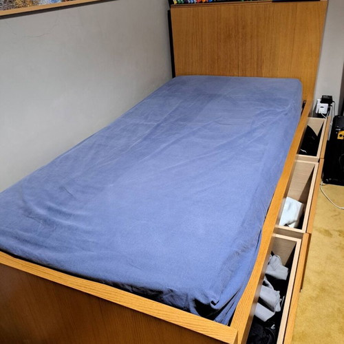 Single bed with storage used, wooden frame with mattress included