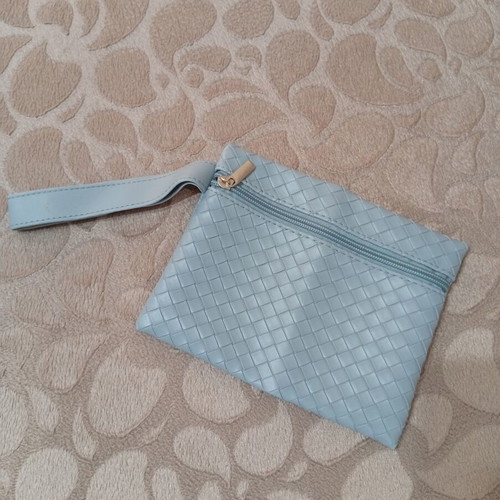 Light blue pouch and toiletry bag