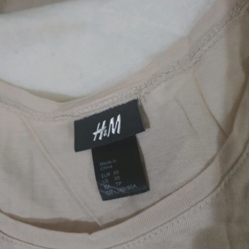H&M beige sleeveless top used with rhinestones, size XS