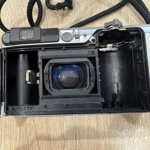 Konica Lexio 70 35mm film camera used with zoom lens