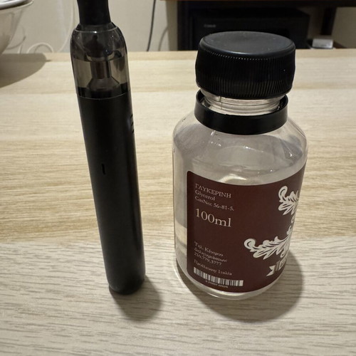 GreekBar electronic cigarette like new with glycerin pack