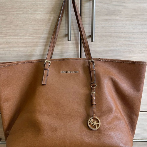 Michael Kors bag used with wear on the trim