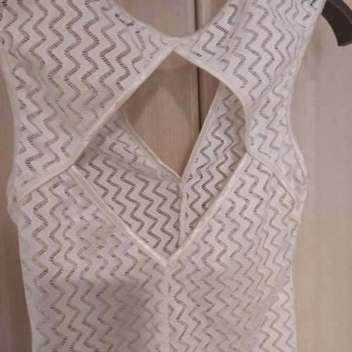 Blouse almost like new with transparency and back opening, size M, white