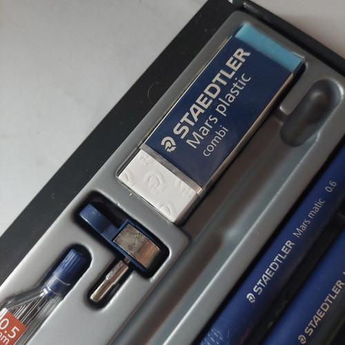Staedtler drawing set used with rapidograph 0.4 and 0.6, eraser, compass adapter, and 0.5 leads