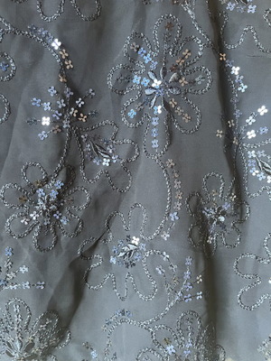 Short-sleeve blouse with transparency and sequins