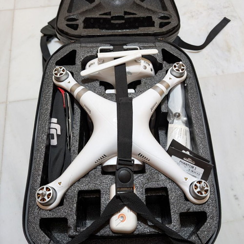 DJI Phantom 3 Advanced drone used with RC, new battery, hardshell case, and propellers