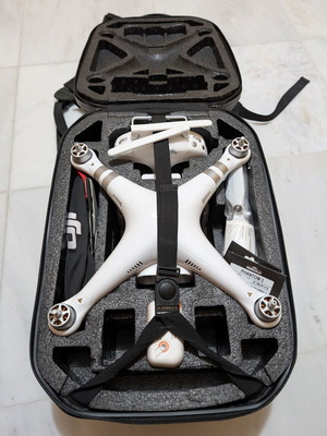 DJI Phantom 3 Advanced drone used with RC, new battery, hardshell case, and propellers