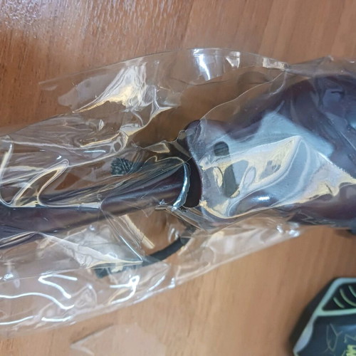 Castanets with hand grip new, brown color