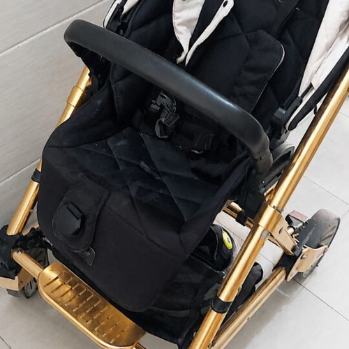 Mamas & Papas baby stroller with some wear on wheels and canopy