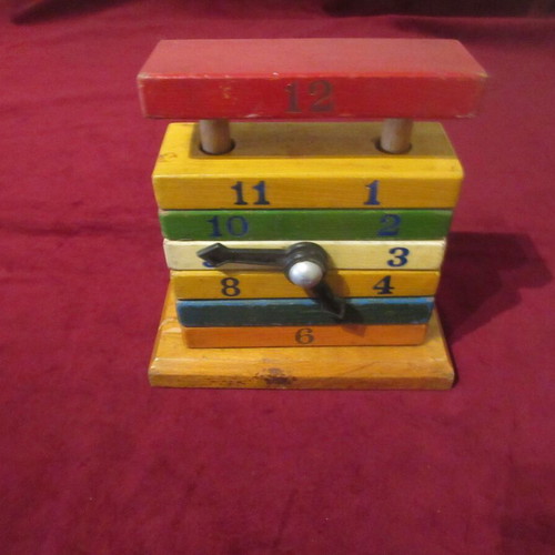 Wooden toy clock coil used 70s
