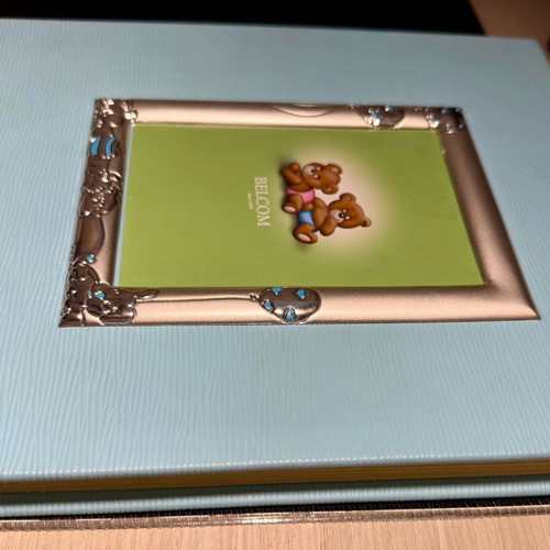 Photo album like new for newborns with silver-plated frame