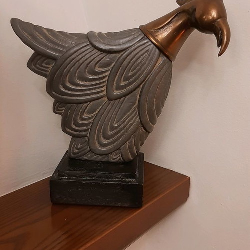 Decorative bird used with metal head and wooden base