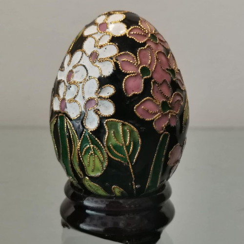 Cloisonne egg used with white and pink cherry blossoms on wooden base