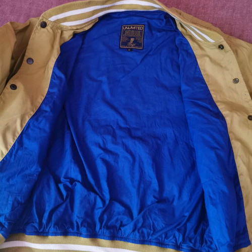Unlimited spring jacket size M like new, gold color