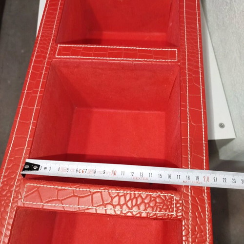 Shelf with red leather upholstery used, 5 compartments for CDs