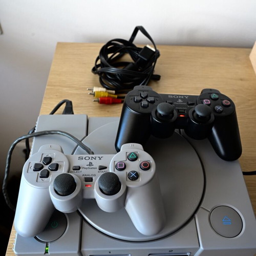 Sony PlayStation 1 SCPH-7002 Fat console used with 2 controllers and memory card