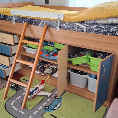 Children's loft bed with ladder and storage used