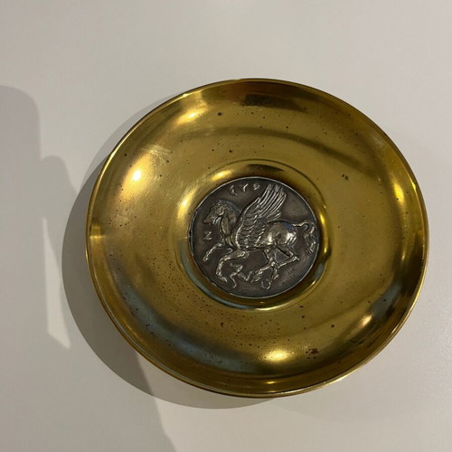 Decorative brass plate with silver Pegasus inlay used