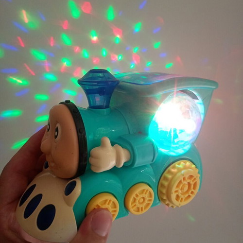 Cute Train toy with sounds, lights and movement, used