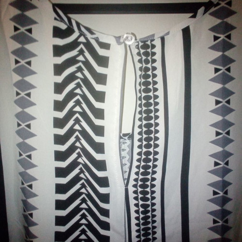 One-piece jumpsuit size S with slanted pockets and belt