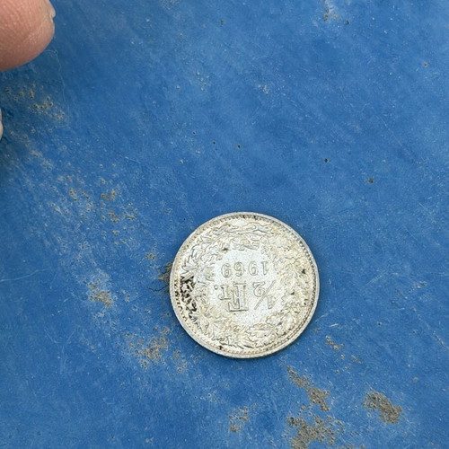 Swiss coin cut in 1969, used