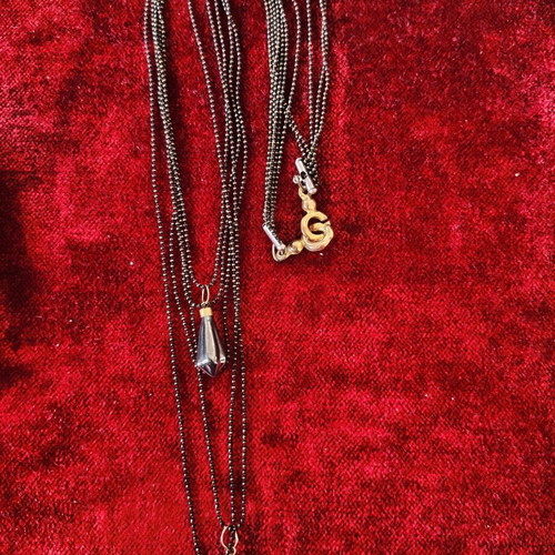 Long necklace used with black beads and hematite pendants