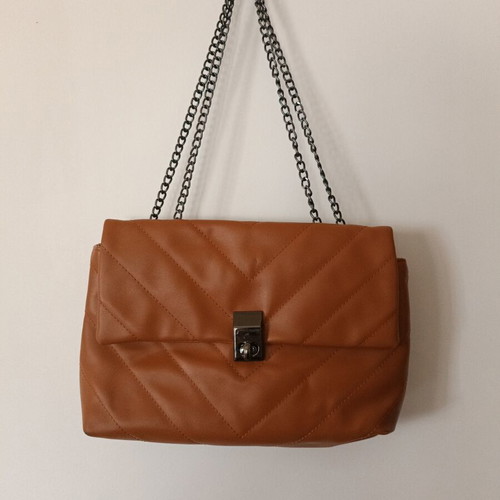 Shoulder bag like new, tan color with chain and quilted design