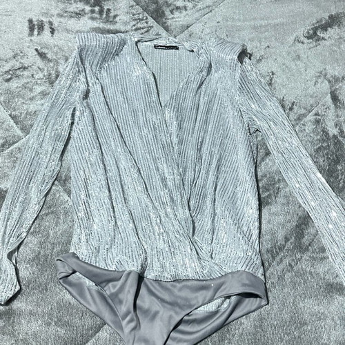 Donna silver sequin bodysuit like new size Large