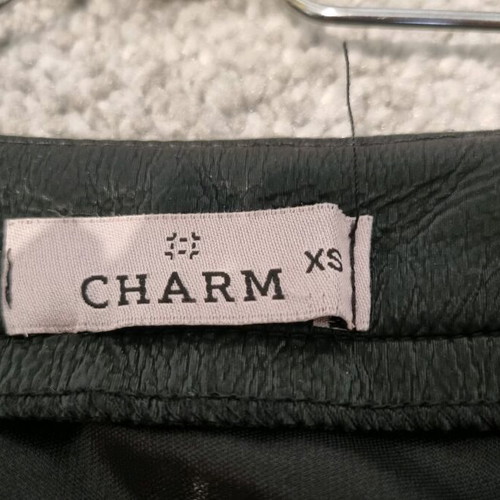 Skirts pack of 2 black, one leather type and one vinyl, used, H&M