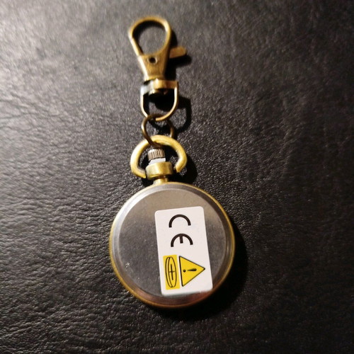 Quartz keychain watch like new, brass color, white dial