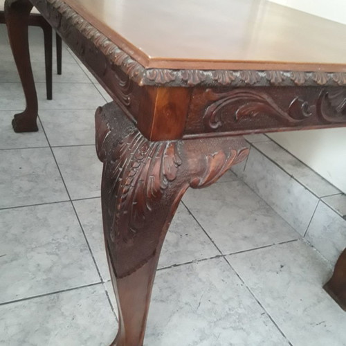 Antique dining table with lion feet