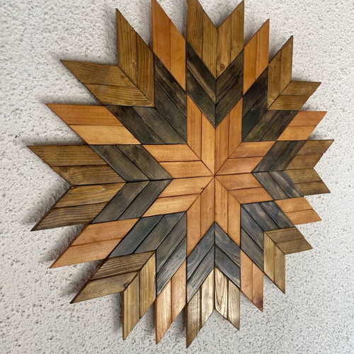 Handmade wooden wall art with geometric Aztec design Ø53 cm