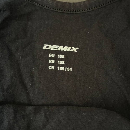 Demix black dance leotard with long sleeves and stars like new, size 128