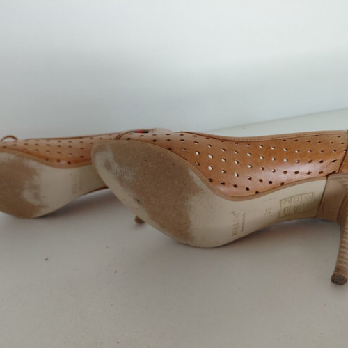 Rollini perforated brown pumps like new, size 39