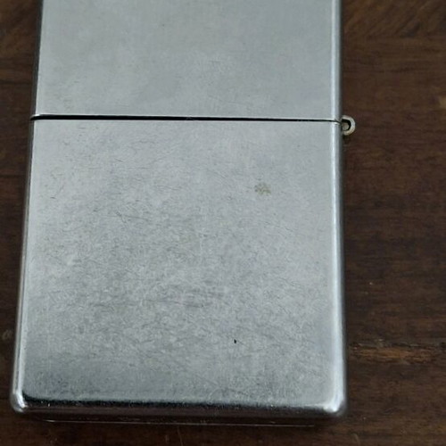 Zippo lighter with skull tattoo design 2004