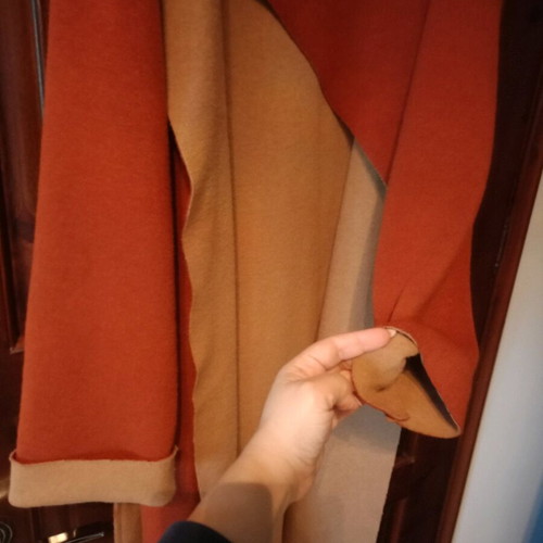 The Knls coat new, tan-cinnamon color, one size, soft without buttons