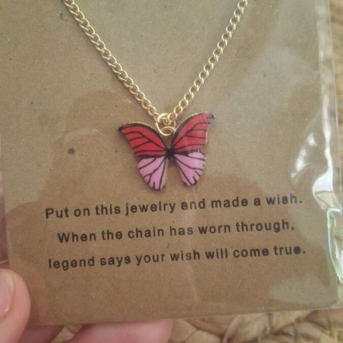 Butterfly necklace new with gold chain and pink eye patches