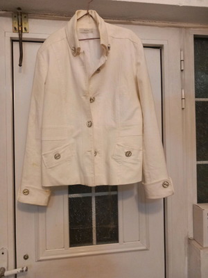 Women's jacket used white cotton with silver buttons