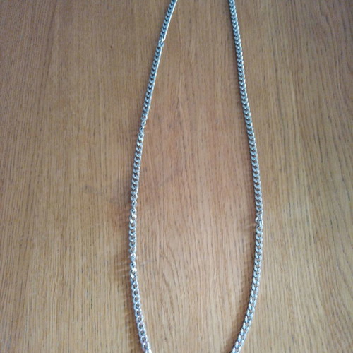 Long chain necklace used